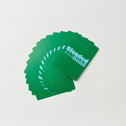 AVAILABLE NOW BLENDED BOND FAMILY GAME cards spread out on a white background.